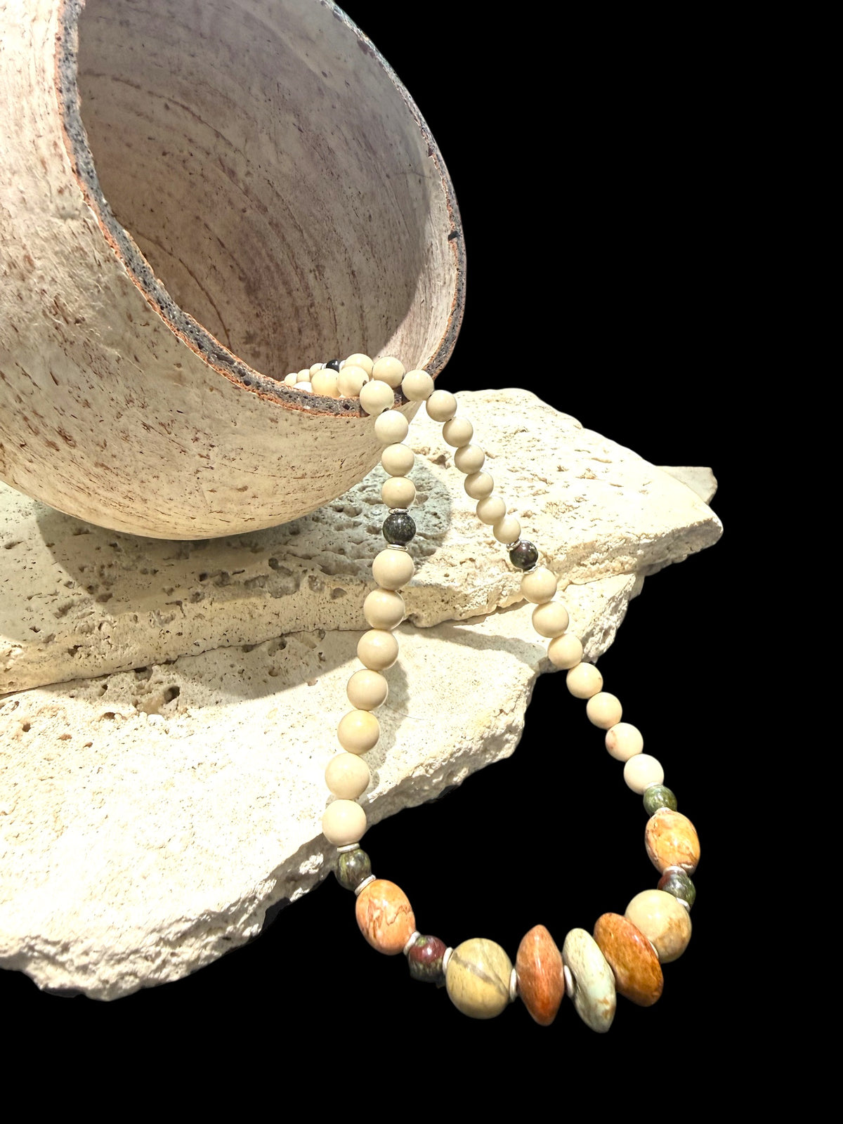 Tribally inspired, pastel toned stone necklace featuring pale turquoise, bloodstone, jasper and sterling silver.  Length 50 cm