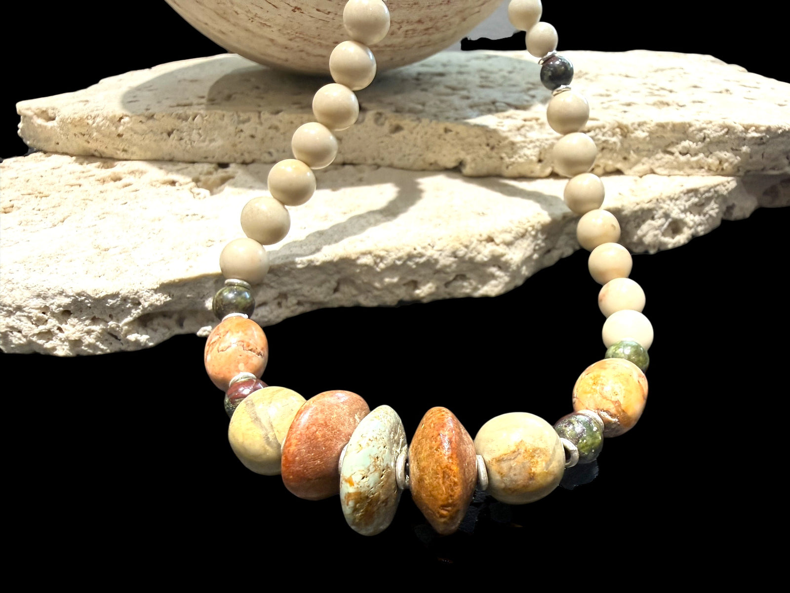 Tribally inspired, pastel toned stone necklace featuring pale turquoise, bloodstone, jasper and sterling silver.  Length 50 cm