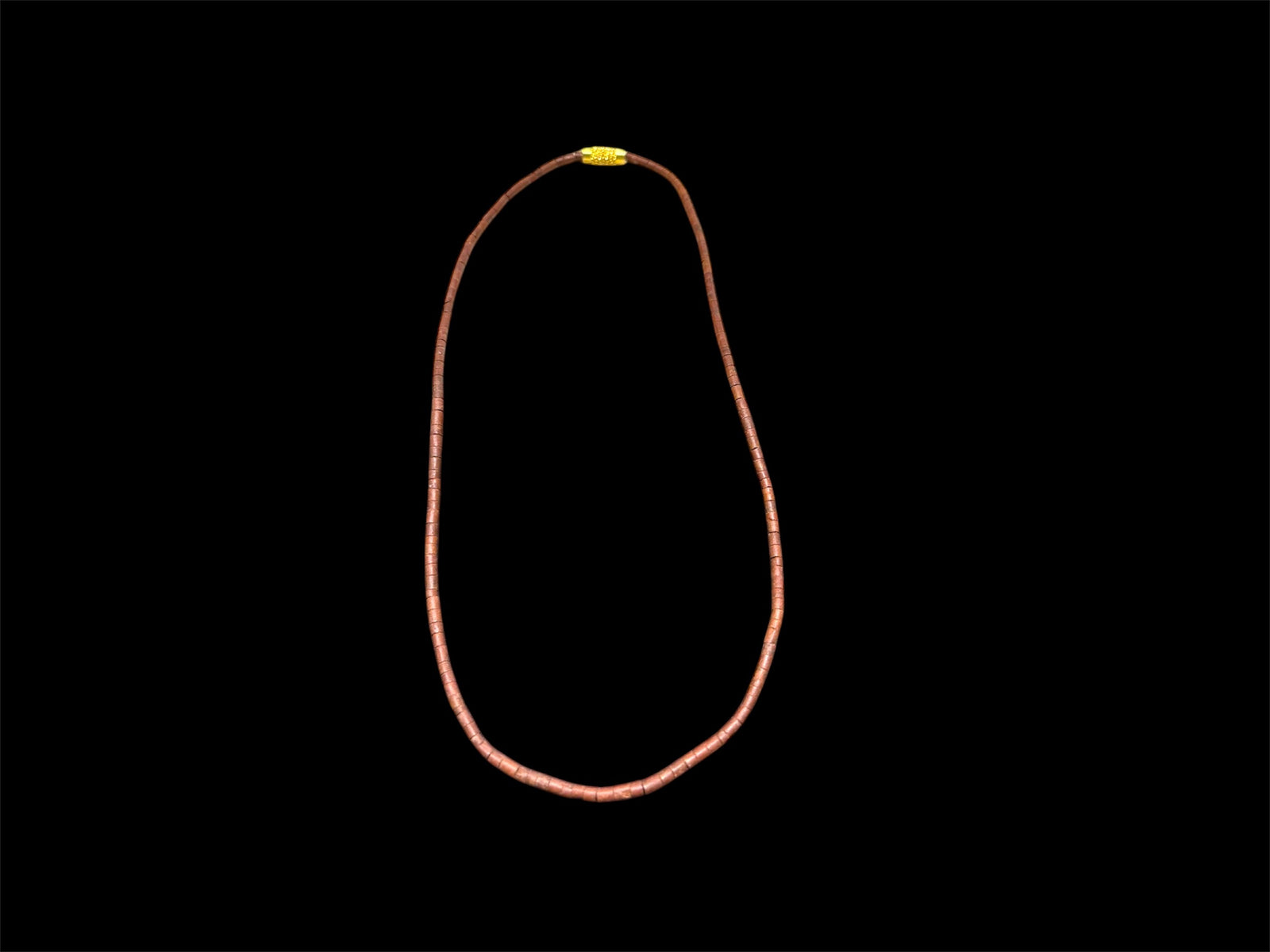 Natural serpentine bead necklace in a mat red-brown colour. Brass metal screw clasp. Measurements: 39 cm length, tube beads 2 mm diameter