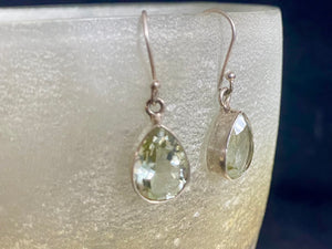 Elegant teardrop green amethyst earrings featuring facet cut gem quality stones. Open at the back to allow the natural light and beauty of the amethysts to shine through. Size 3.2 cm length including hook.