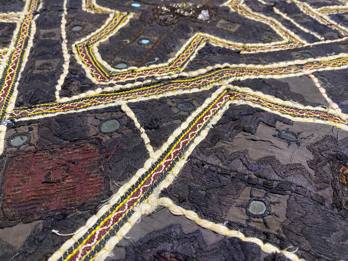 Authentic vintage Rabari textile featuring mirror-work, hand embroidery, applique and silver metal thread zari work. Mid 20th Century, from the Sind Desert region of Rajasthan. The textile is in excellent condition apart from some nibbles to the side of the textile. Measurements: 136 x 170 cm