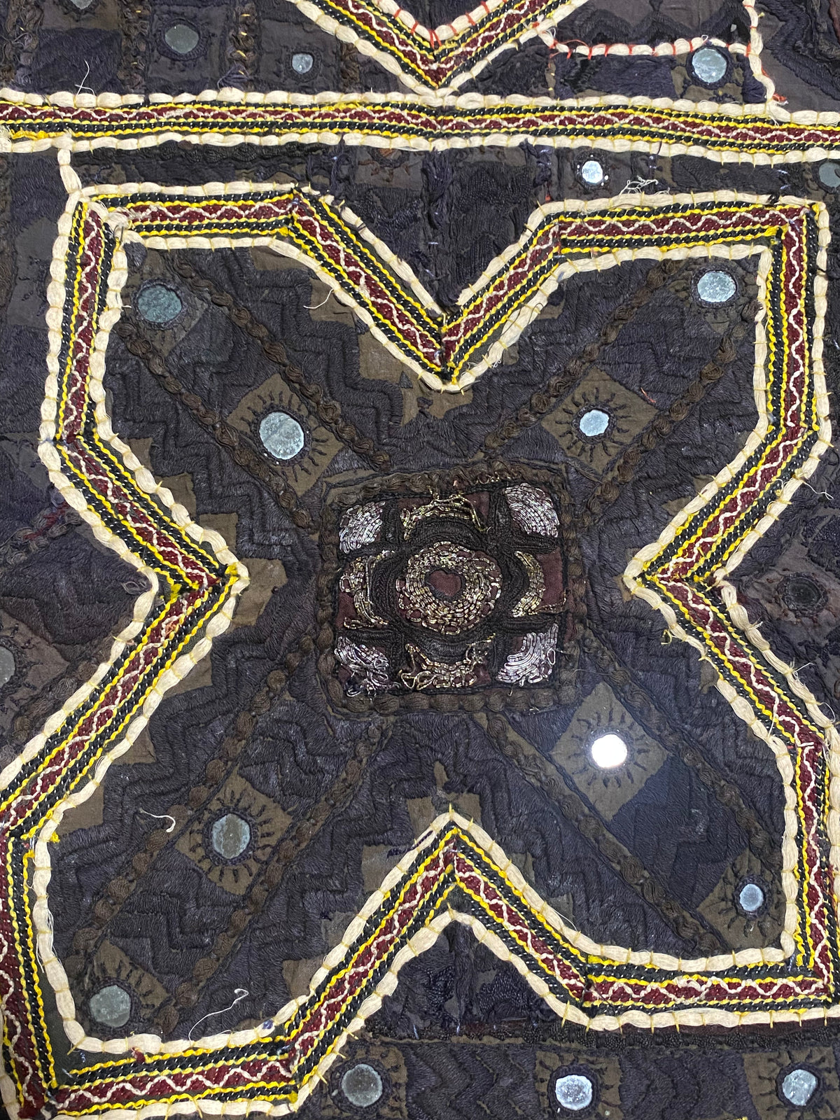 Authentic vintage Rabari textile featuring mirror-work, hand embroidery, applique and silver metal thread zari work. Mid 20th Century, from the Sind Desert region of Rajasthan. The textile is in excellent condition apart from some nibbles to the side of the textile. Measurements: 136 x 170 cm