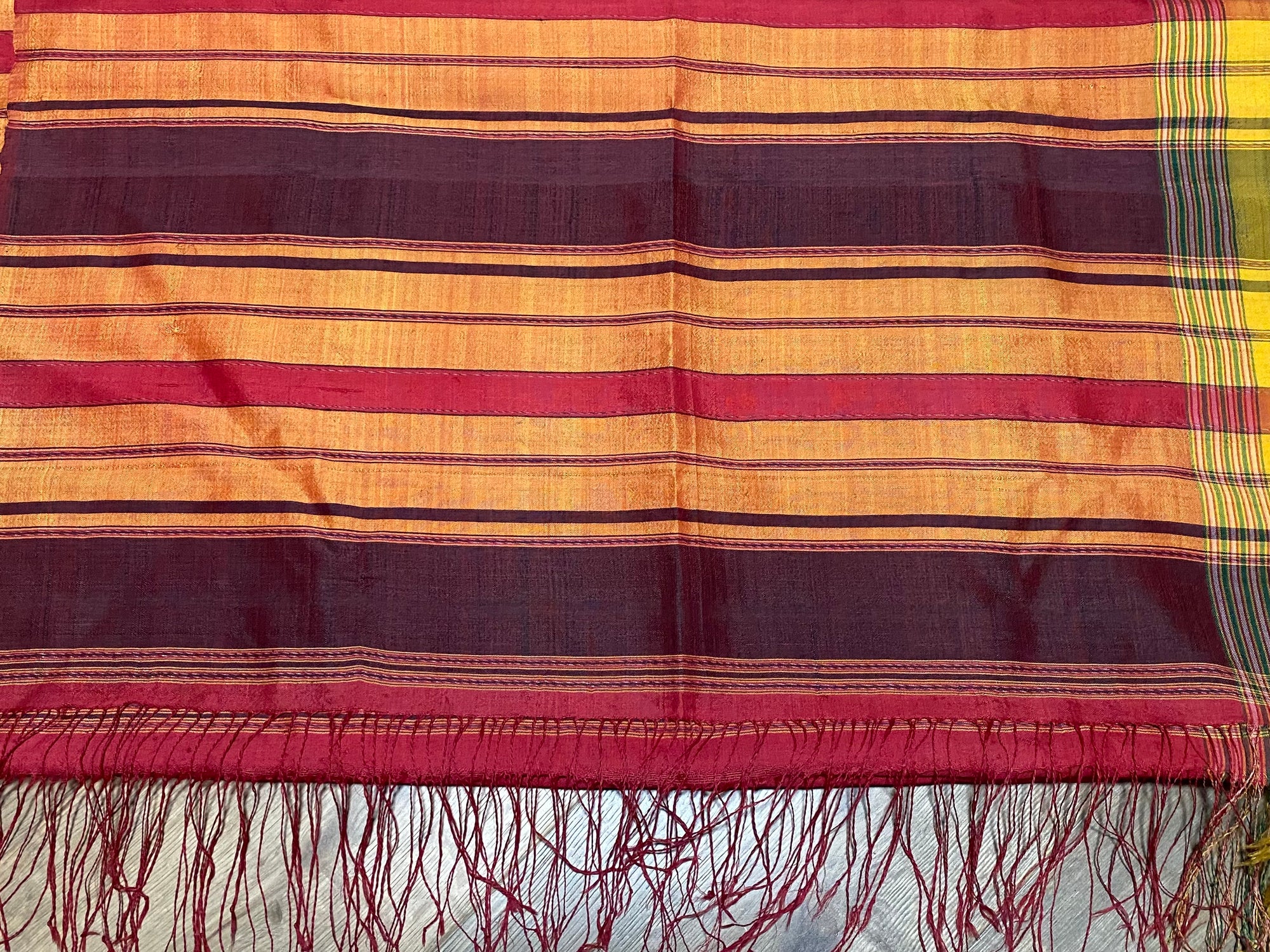 Rare classic example of a balanced tabby-weave silk shawl from Turkmenistan. Silk, terminating in fringed ends. This shawl is new, but was collected by my father in the 1990's and to our knowledge is an heirloom piece, woven in the early 20th century. In superb condition. 373 x 82 cm, not including fringes.