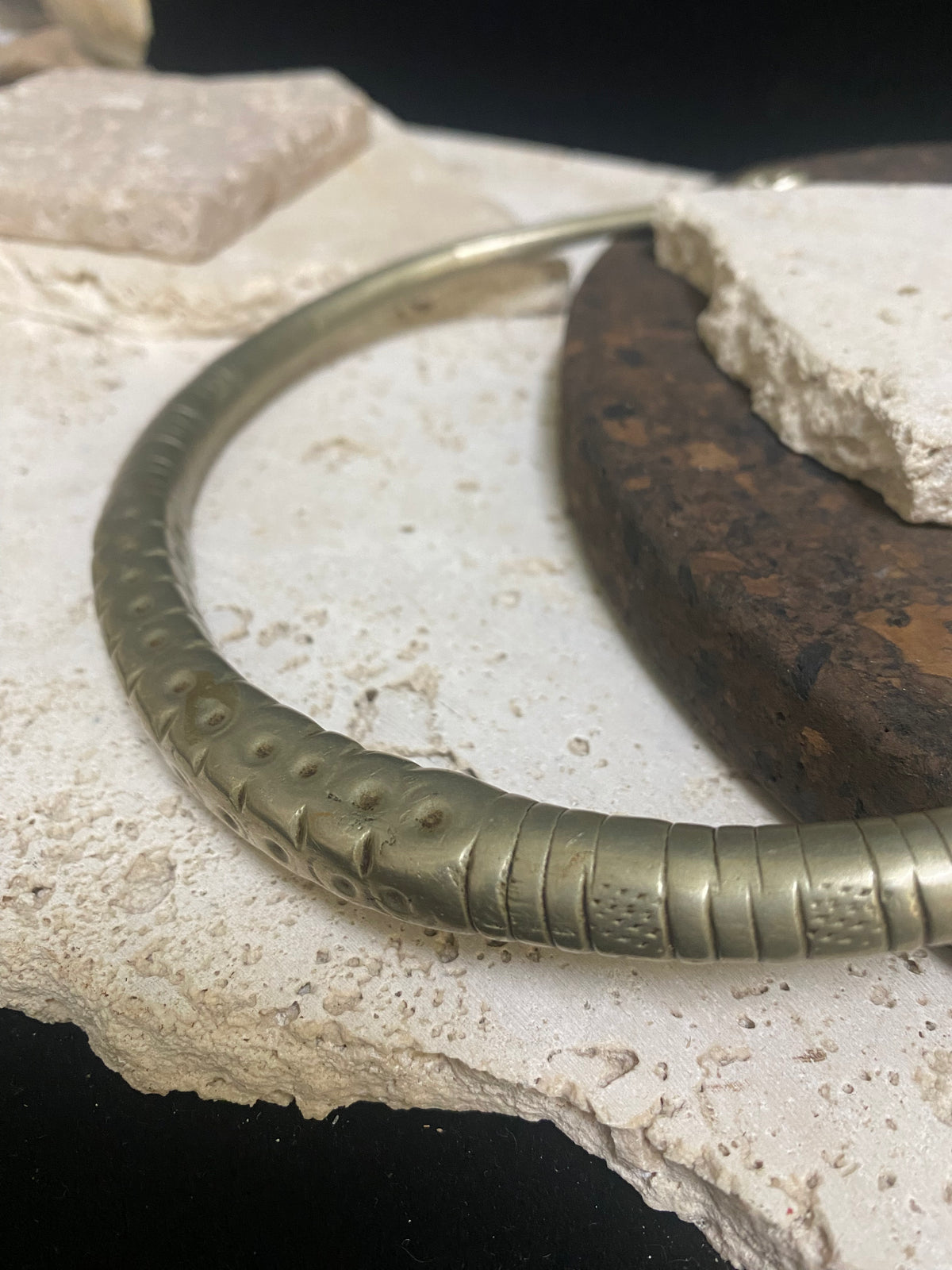 Solid cast & chiselled hansuli torque. rural Gujarat, India. Coin silver. 19th century. Width 16 cm, width at opening 7 cm. Weight 260 g