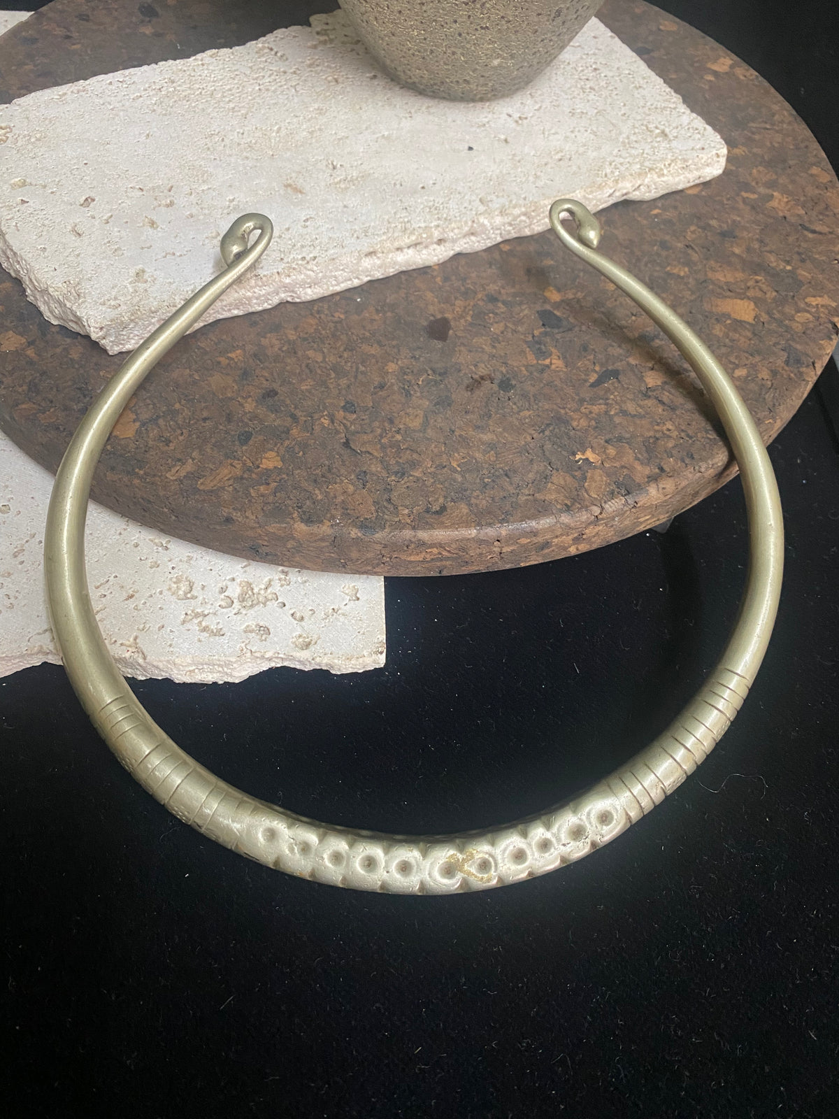 Solid cast & chiselled hansuli torque. rural Gujarat, India. Coin silver. 19th century. Width 16 cm, width at opening 7 cm. Weight 260 g