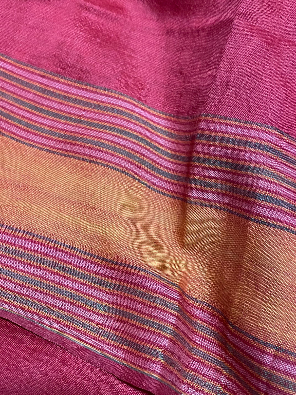 Rare classic example of a balanced tabby-weave silk shawl from Turkmenistan. Silk, terminating in fringed ends. This shawl is new, but was collected by my father in the 1990's and to our knowledge is an heirloom piece, woven in the early 20th century. In superb condition. 373 x 82 cm, not including fringes.