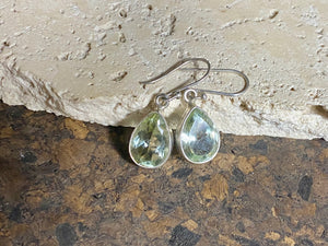 Elegant teardrop green amethyst earrings featuring facet cut gem quality stones. Open at the back to allow the natural light and beauty of the amethysts to shine through. Size 3.2 cm length including hook.