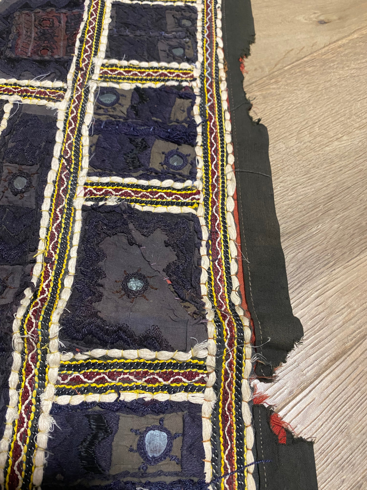 Authentic vintage Rabari textile featuring mirror-work, hand embroidery, applique and silver metal thread zari work. Mid 20th Century, from the Sind Desert region of Rajasthan. The textile is in excellent condition apart from some nibbles to the side of the textile. Measurements: 136 x 170 cm