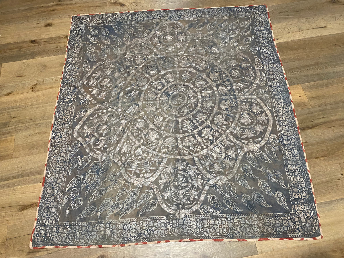 Pichwai temple hanging, silver leaf on a ground of handwoven cotton, featuring Krishna, gopis and apsaras. This devotional cloth hanging was made by Shri Nathji devotees of the Pushti Marg Sect. A large and rare circular-patterned example dating to late 19th Century and a collector's item. Measurements: 173 x 157 cm