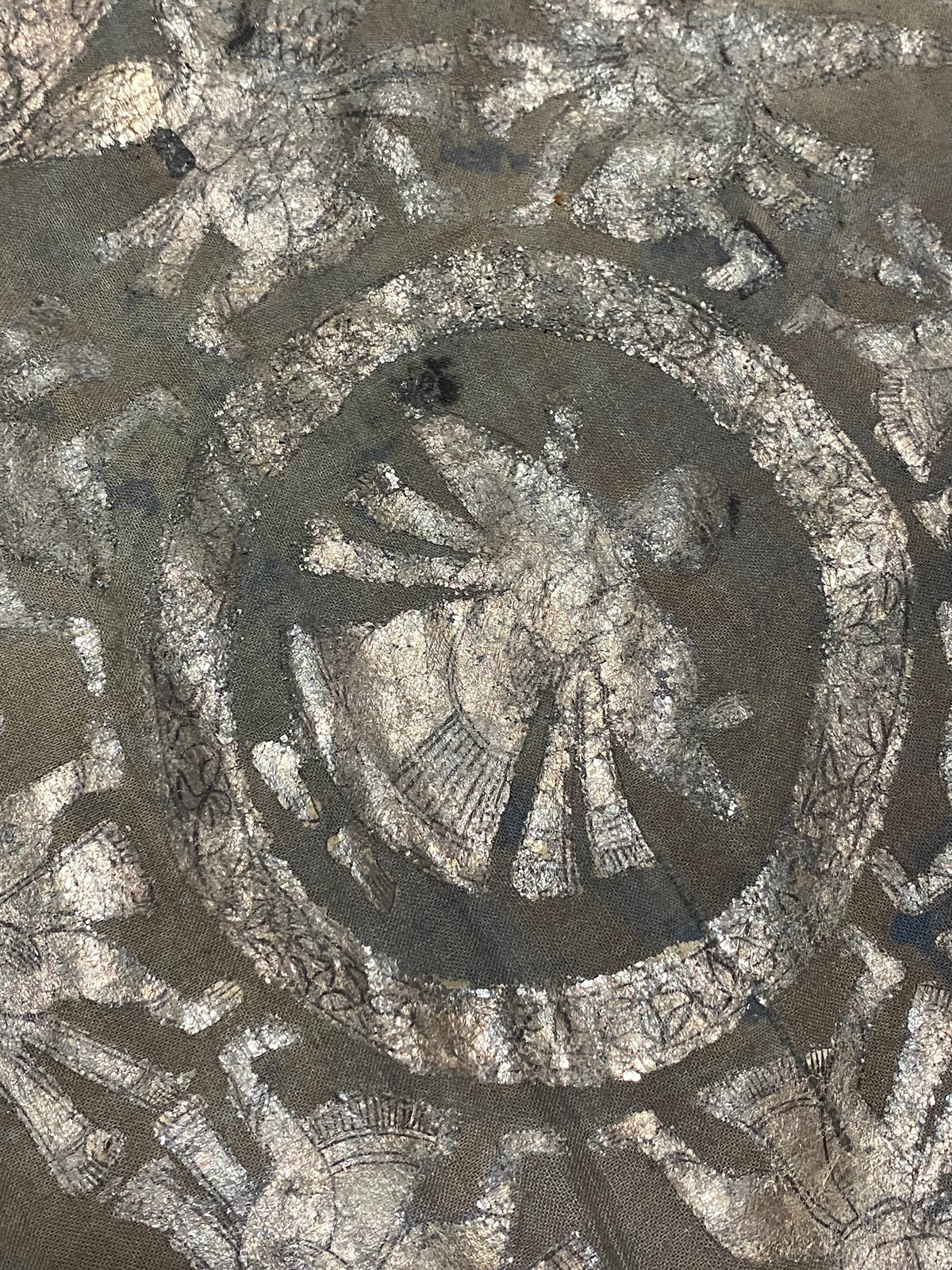 Pichwai temple hanging, silver leaf on a ground of handwoven cotton, featuring Krishna, gopis and apsaras. This devotional cloth hanging was made by Shri Nathji devotees of the Pushti Marg Sect. A large and rare circular-patterned example dating to late 19th Century and a collector's item. Measurements: 173 x 157 cm