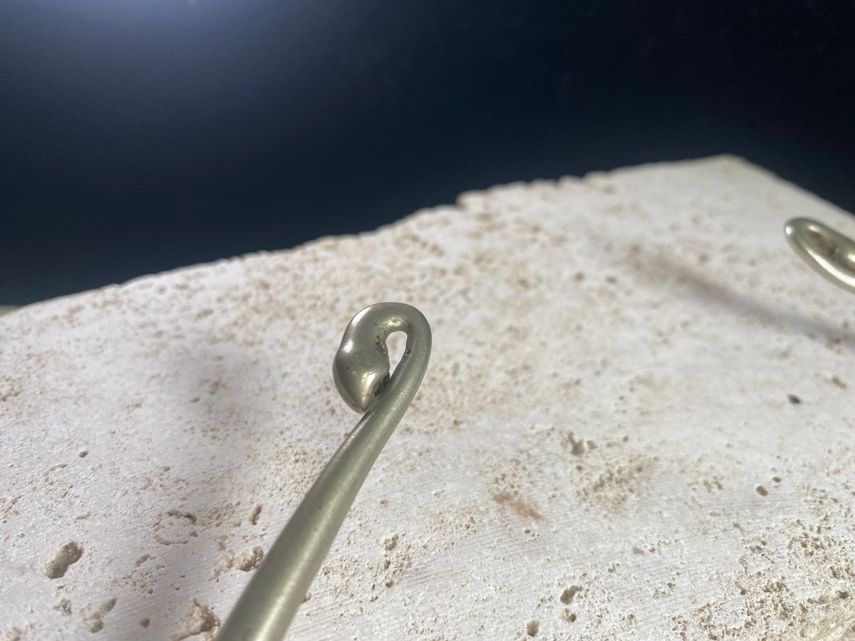 Solid cast & chiselled hansuli torque. rural Gujarat, India. Coin silver. 19th century. Width 16 cm, width at opening 7 cm. Weight 260 g