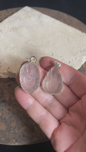 Hand carved clear quartz pendants depicting Ganesh. These are unique pieces with a beautiful clarity. Sterling silver frames and bails.  These unisex quartz pendants will suit both men and women.