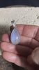 Teardrop rainbow moonstone pendant set in lovely twisted silver sterling silver surround with a generous bail to take a large chain or cord. A lovely stone with blue fire.&nbsp;  Measurements: Length including bail 3.6 cm, width at widest point 1.8 cm