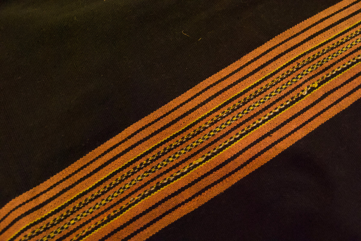 Vietnamese tribal cloth or tribal clothing for women, a rare beaded vintage tube skirt from the Co Tu people of central Vietnam also called Kotu people. Hand loomed on a foot braced back strap loom. Measurements: 62 cm length x 140 cm total width doubled and sewn into a tube 70 cm wide.