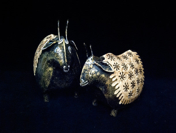 Beautiful Indian themed homewares in the form of fat happy cows.  A most delightful take on the holy cow. These figures are made from recycled cast iron, are hand painted. Two sizes to choose from, 26 cm and 23 cm