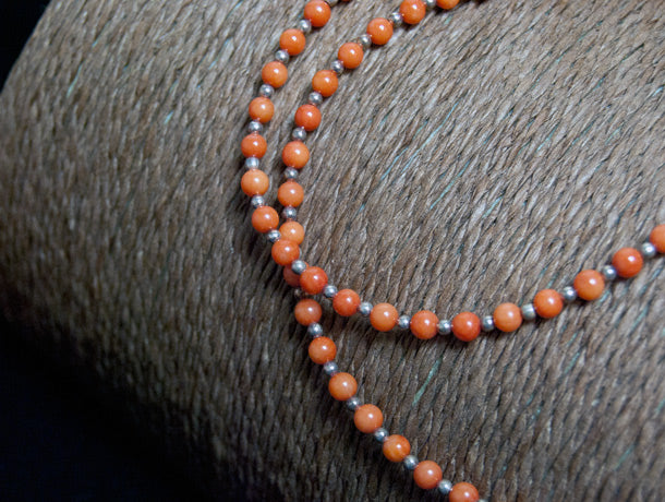 fine red coral bead necklace finished with sterling silver