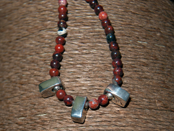 Red jasper and silver women's necklaceRed jasper necklace with three silver pendants and silver clasp