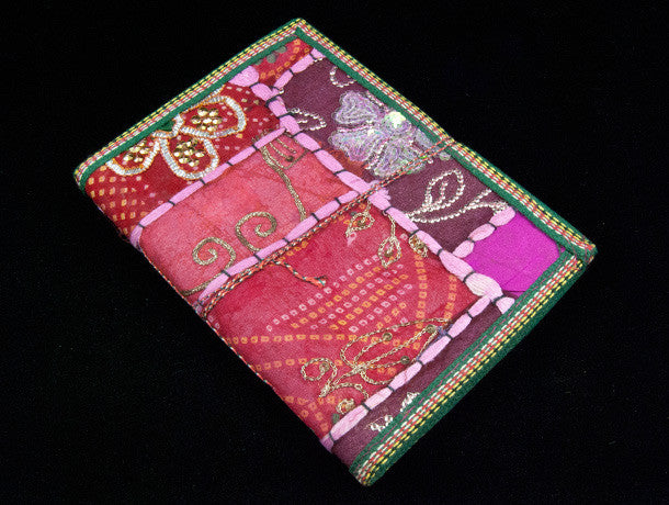 Eco-friendly sari cover journal notebooks are filled with creamy white, handmade recycled notebook paper and are covered in a patchwork of old cotton sari textiles, all finished with cotton, thread and sequin detailing. Three sizes