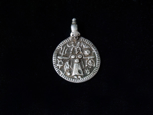 Antique silver Kali amulet pendant - sterling silver, southern India. Height 3.2 cm