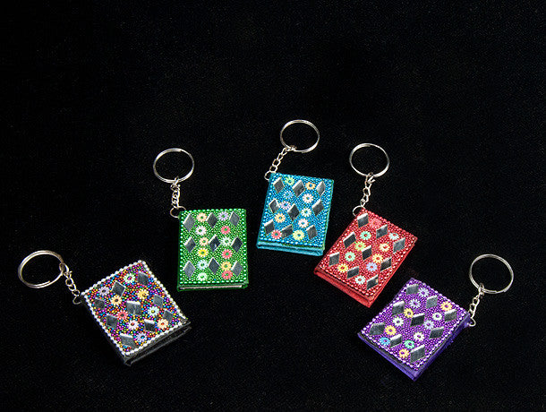 Miniature handmade notebook on a keyring  that's bright, decorative and a favourite with kids in five colours