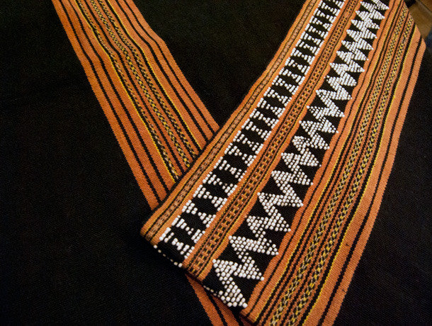 Vietnamese tribal cloth or tribal clothing for women, a rare beaded vintage tube skirt from the Co Tu people of central Vietnam also called Kotu people. Hand loomed on a foot braced back strap loom. Measurements: 62 cm length x 140 cm total width doubled and sewn into a tube 70 cm wide.