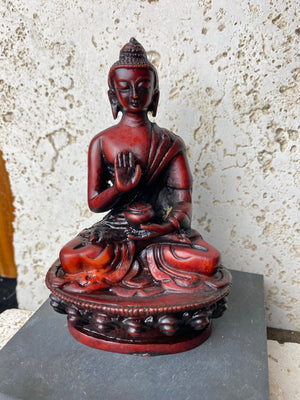 Protection Buddha statue cast from high-quality resin and finished by hand. From a Tibetan artisan exiled in Nepal..  11 cm high
