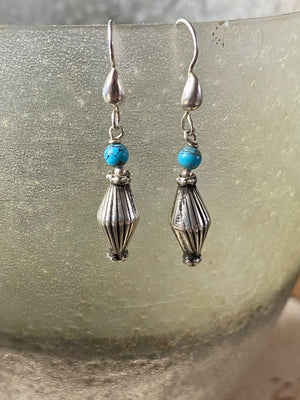 Vintage silver bead from India is teamed up with genuine American turquoise to create a beautiful boho drop earring