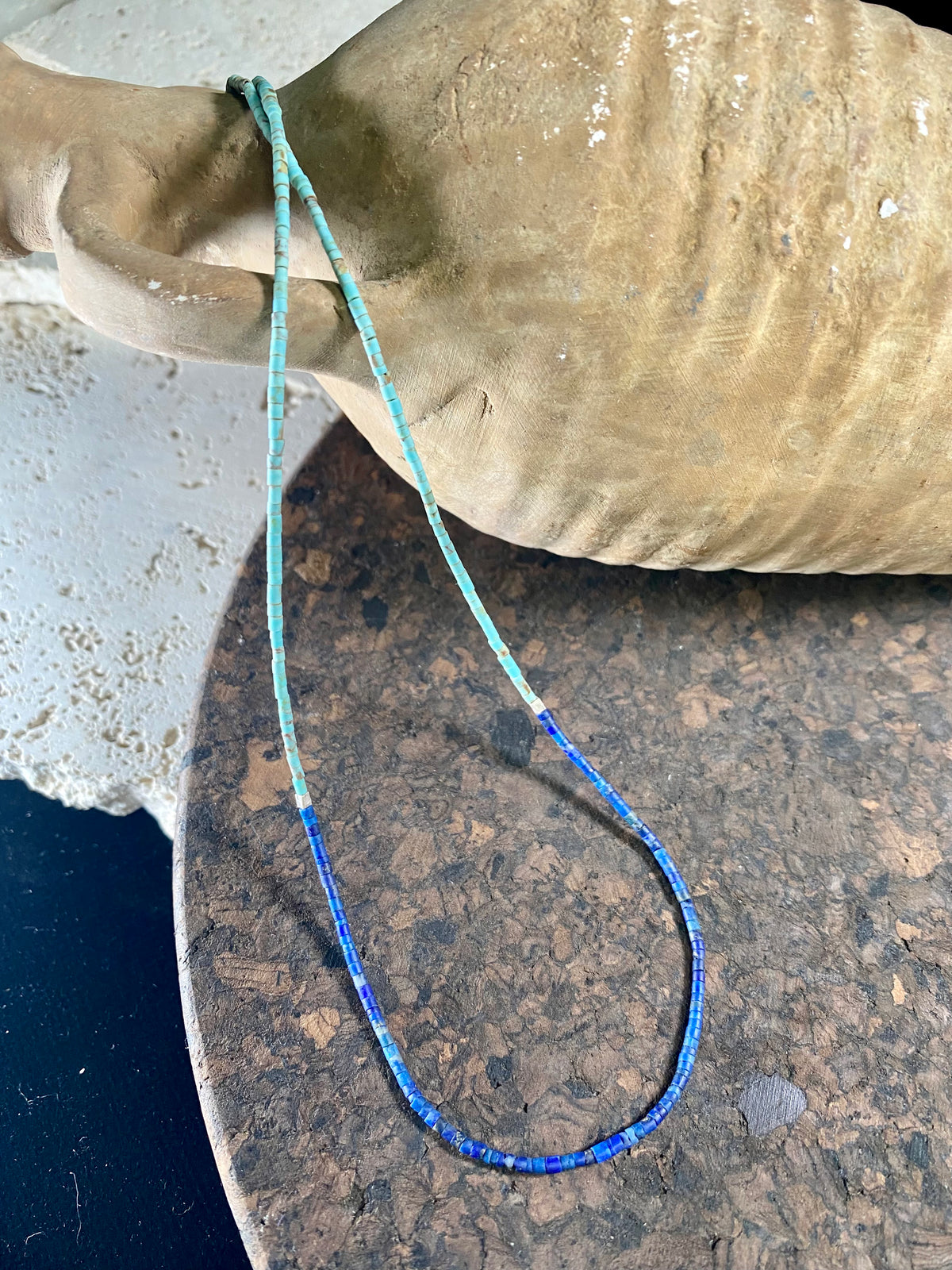 Fine necklace of lapis lazuli and turquoise hand cut beads, highlighted with sterling silver