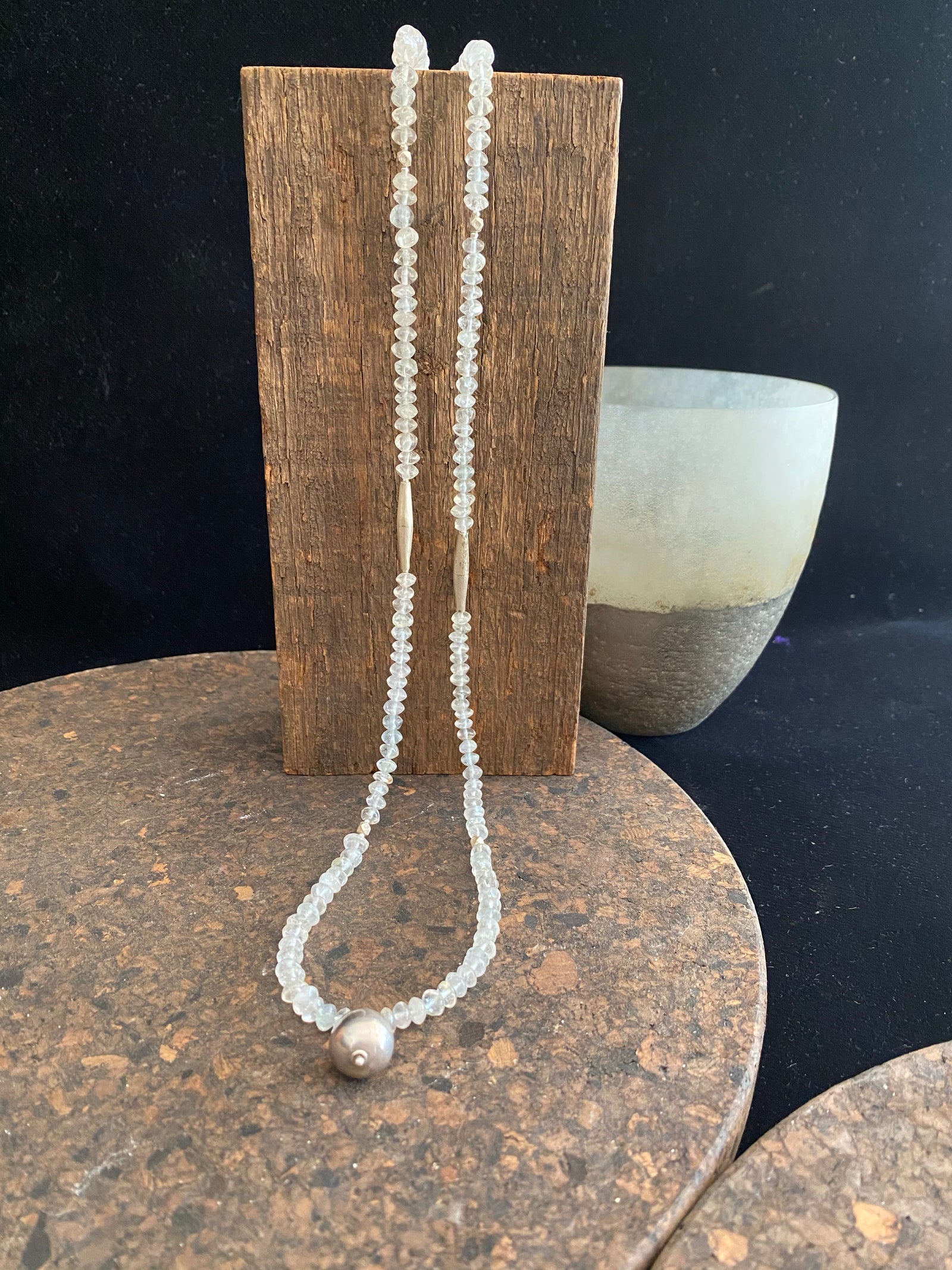 Long beaded necklace of natural, rondelle cut aquamarine beads with 95% tribal silver highlights and sterling silver findings. 74 cm length