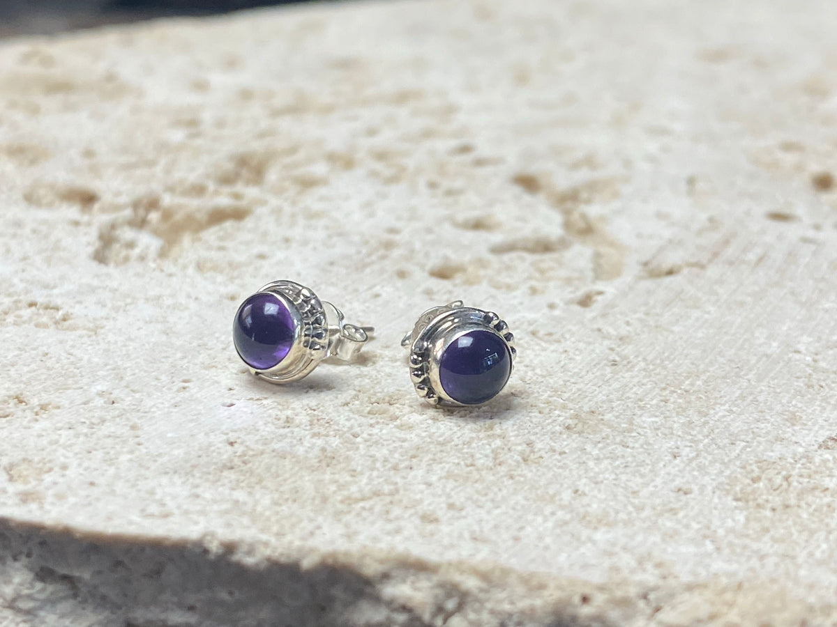 small amethyst earring studs are hand made from sterling silver