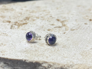 small amethyst earring studs are hand made from sterling silver