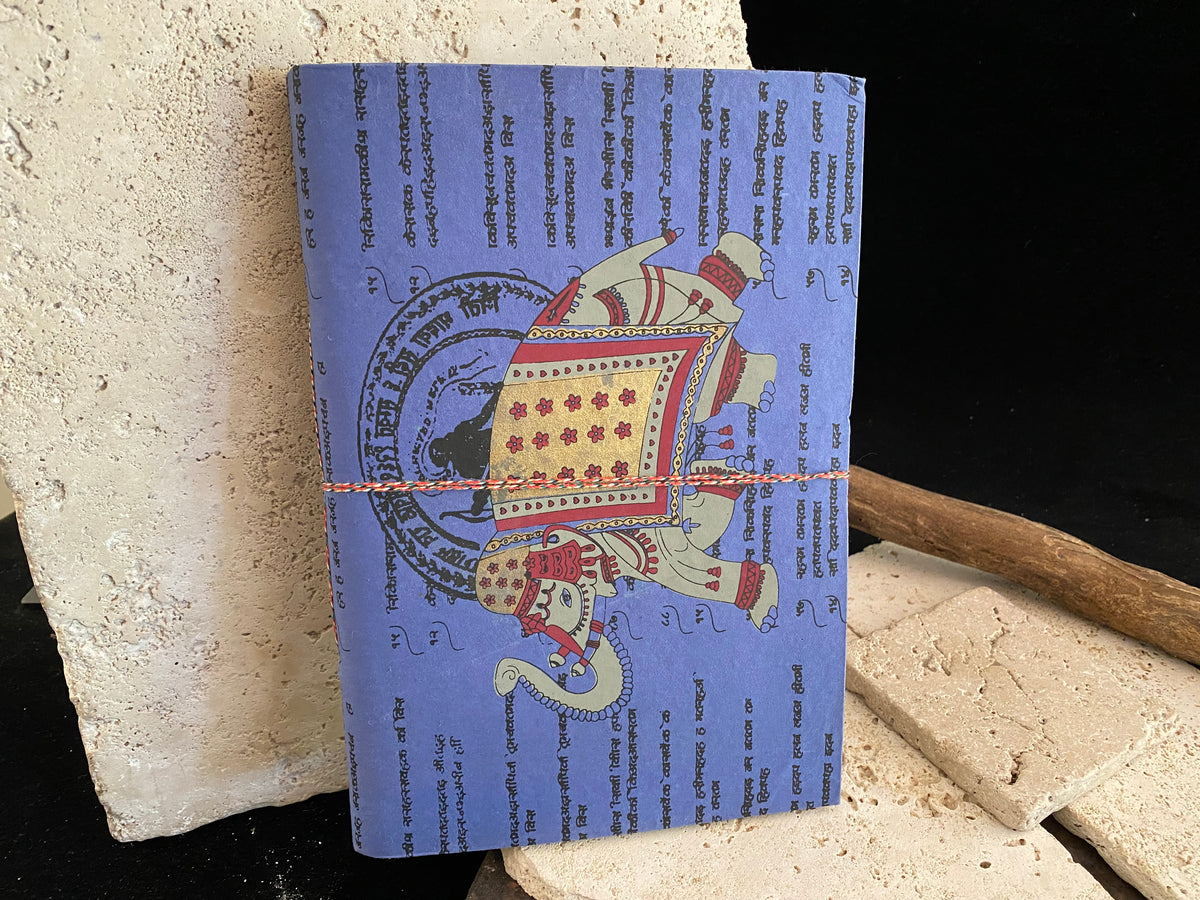 Eco-friendly journals, the perfect size at 25 x 17 cm (10 x 6.75"). Filled with handmade recycled paper and covered in bright, printed covers. Excellent for use as a journal, writer's notebook, scrapbook, travel diary or notebook.