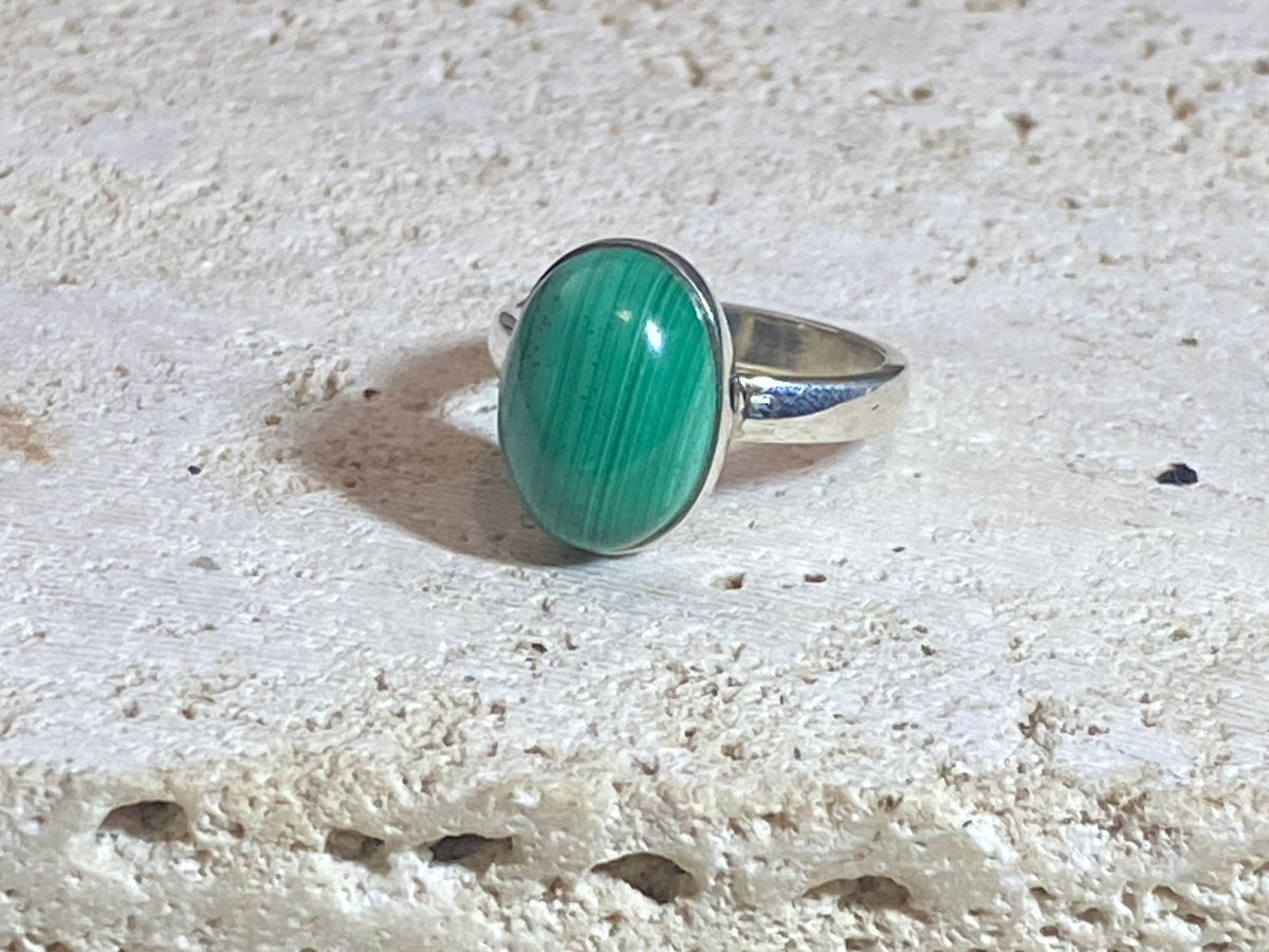 Oval malachite rings set in sterling silver. sizes 7 - 7.5