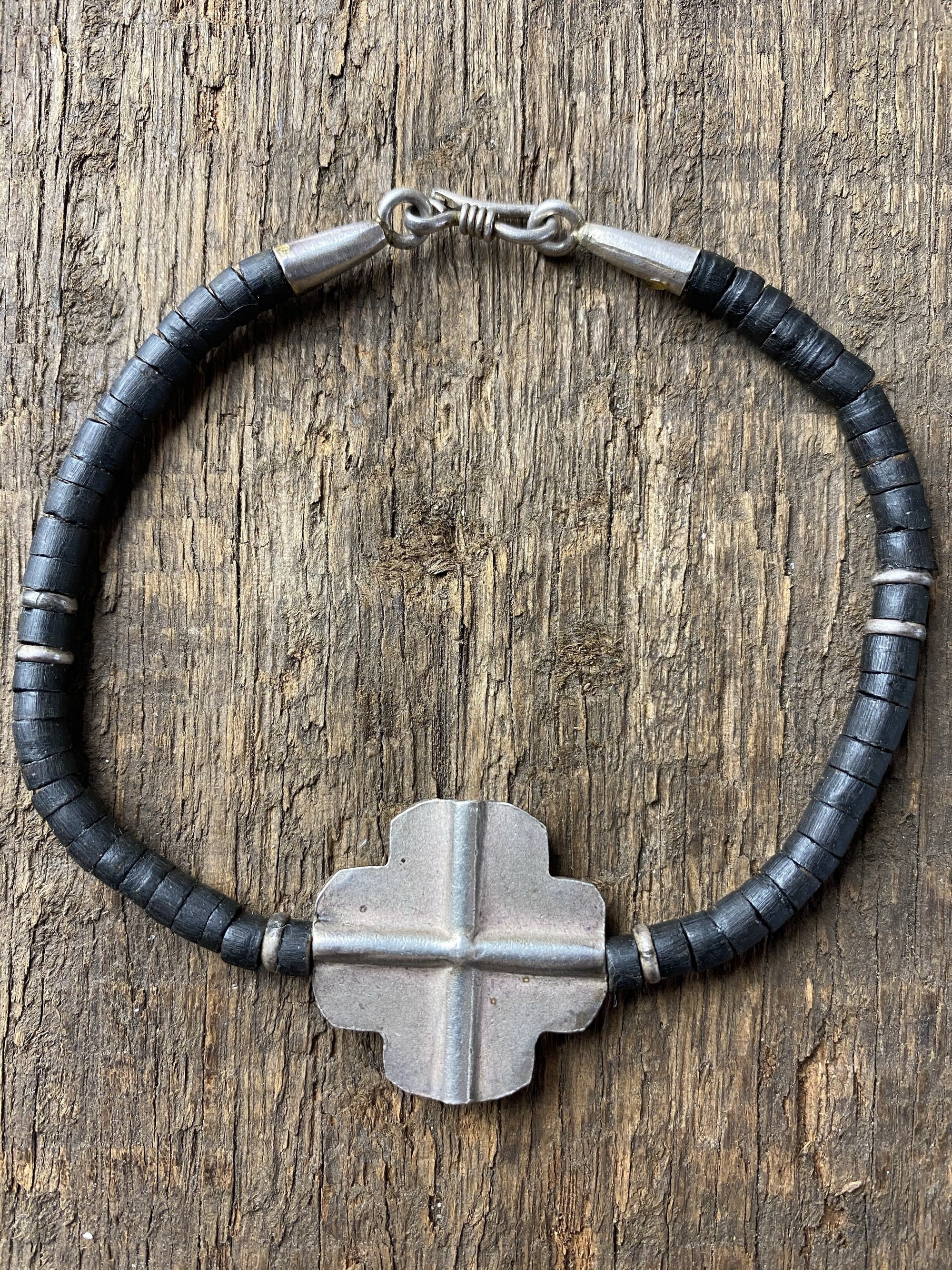 Coconut wood beads and Karen hilltribe 95% pure silver cross feature with silver detailing and hook clasp