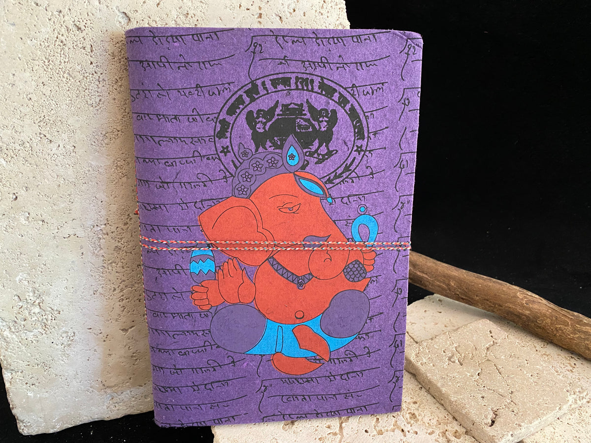 Eco-friendly journals, the perfect size at 25 x 17 cm (10 x 6.75"). Filled with handmade recycled paper and covered in bright, printed covers. Excellent for use as a journal, writer's notebook, scrapbook, travel diary or notebook.