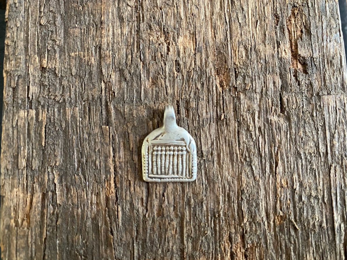 Antique silver amulets representing the Hindu god Skanda and the seven mothers, traditionally worn for protection. Early 19th - early 20th century