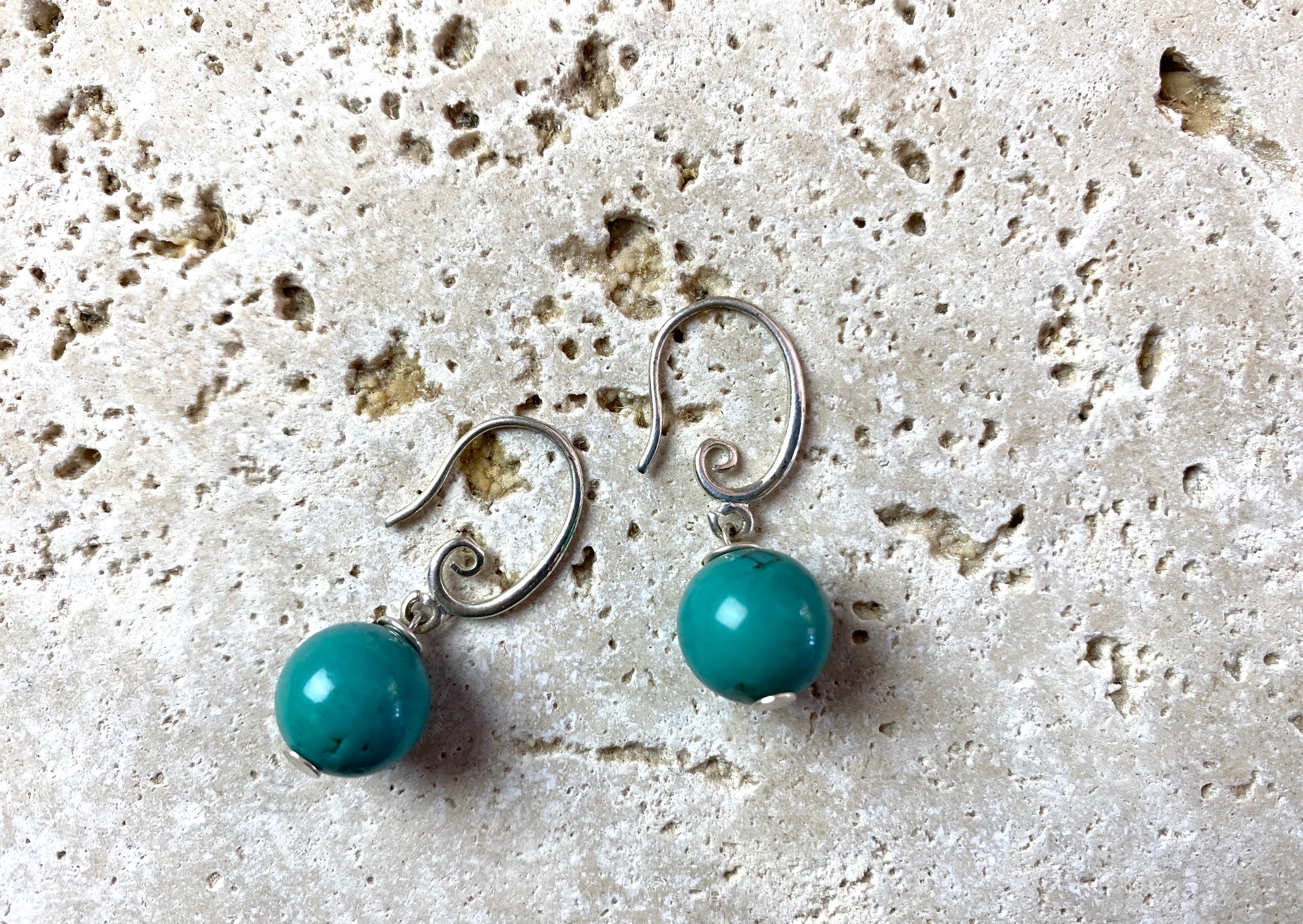 Simple and elegant turquoise ball earring drops finished with sterling silver hooks