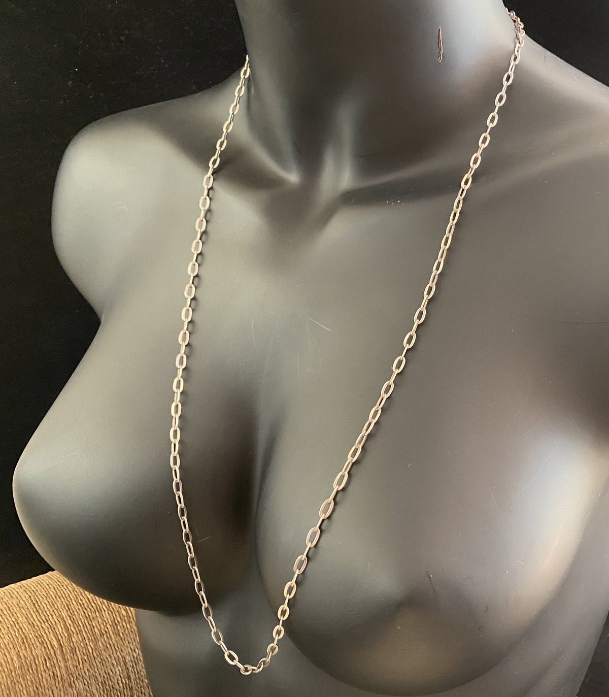 Elegant, open link chain featuring flat, oval links. Crafted from sterling silver and finished with a ring clasp.  Length 80 cm/31.5"