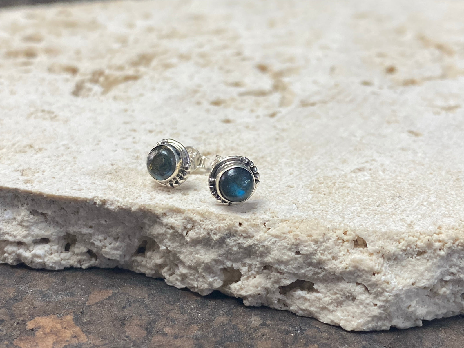 These small labradorite studs are hand made from sterling silver and set with natural labradorite cabochon stones