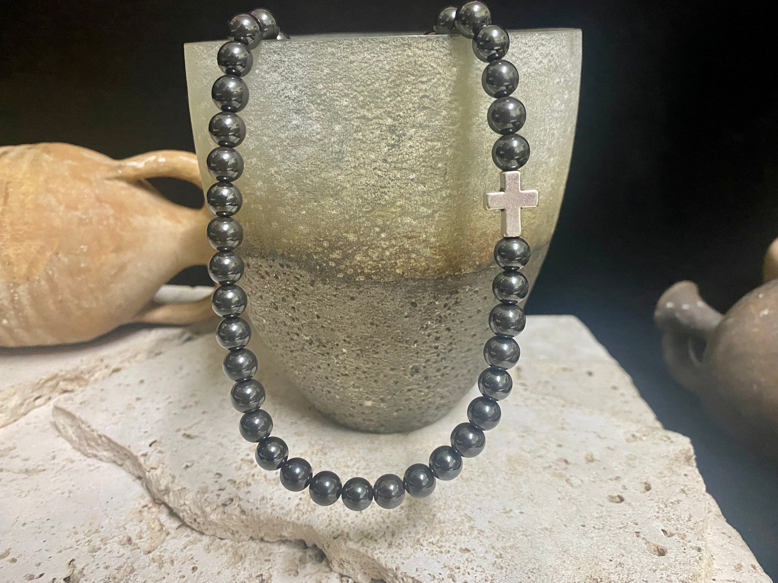Beautiful unisex hematite necklace of perfectly cut round beads highlighted with a silver cross and sterling silver hook clasp. Can be worn by men or women. Length 50.5 cm