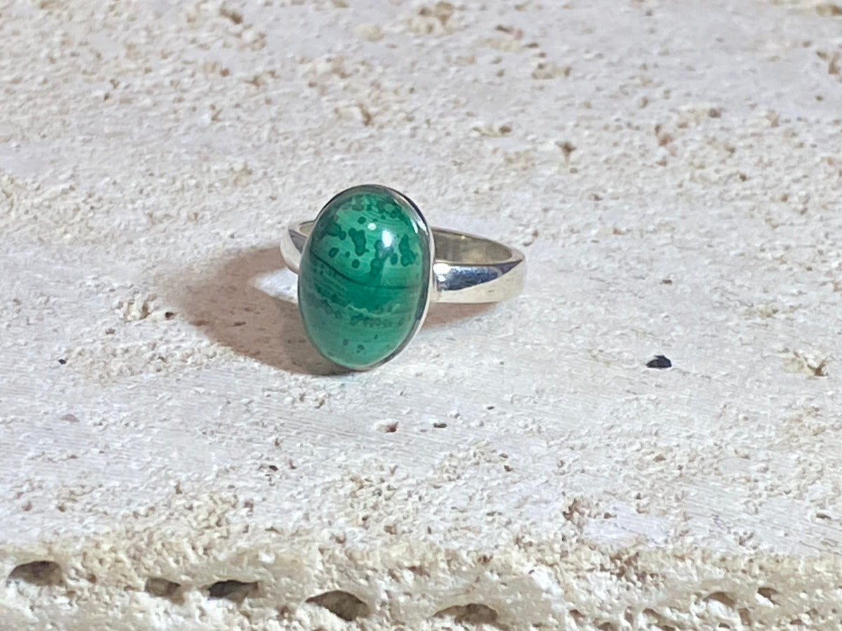 Oval malachite rings set in sterling silver. sizes 7 - 7.5
