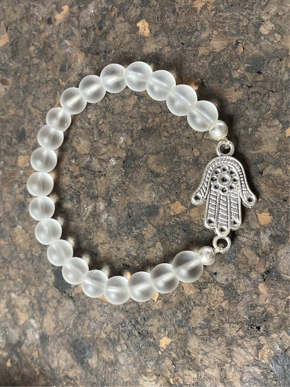 Rock crystal and hamsa elasticized bracelet, 18 cn inside diameter