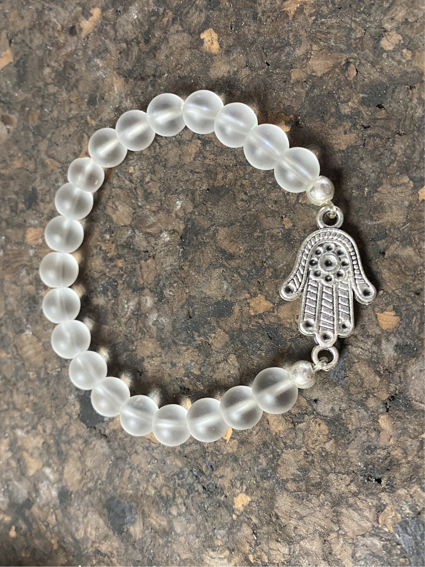 Rock crystal and hamsa elasticized bracelet, 18 cn inside diameter