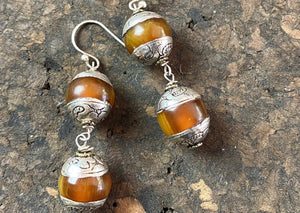 Vintage silver capped amber earrings finished with sterling silver in beautiful Boho style. 