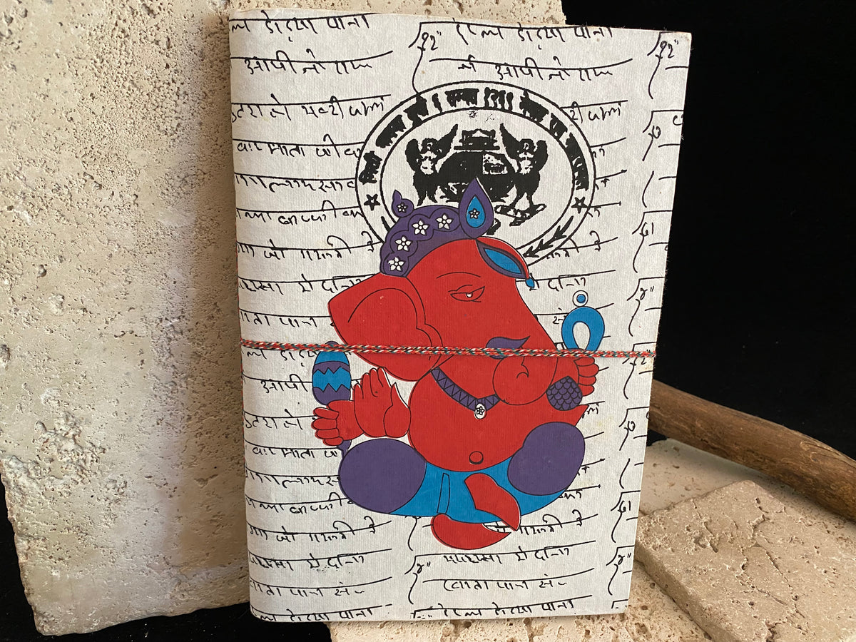 Eco-friendly journals, the perfect size at 25 x 17 cm (10 x 6.75"). Filled with handmade recycled paper and covered in bright, printed covers. Excellent for use as a journal, writer's notebook, scrapbook, travel diary or notebook.