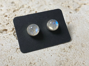Simple and elegant large round rainbow moonstone earring studs, hand made from sterling silver and set with polished natural gemstones cut in cabochon style