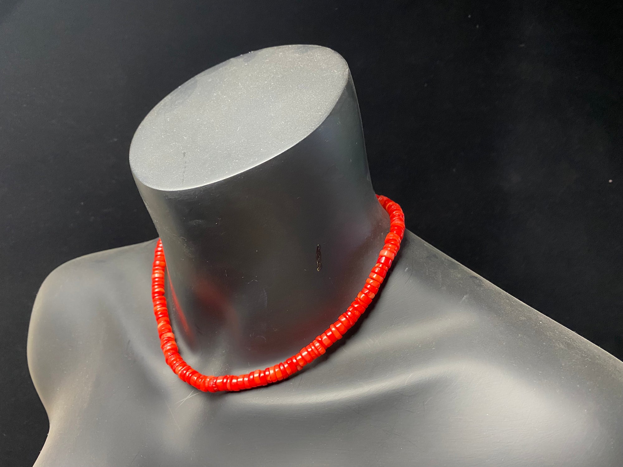 Our simple coral necklace features red coral heshi beads finished with a sterling silver beads and hook clasp. A smart and elegant Southwest style choker that can be worn by men or women.  Bamboo coral is dyed and responsibly sourced from the Pacific Ocean. Length 45 cm (17.75"), diameter of beads 7 mm