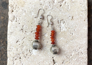 Carnelian rondel beads team up with vintage silver Indian beads to give a beautiful drop earring with a tribal boho style