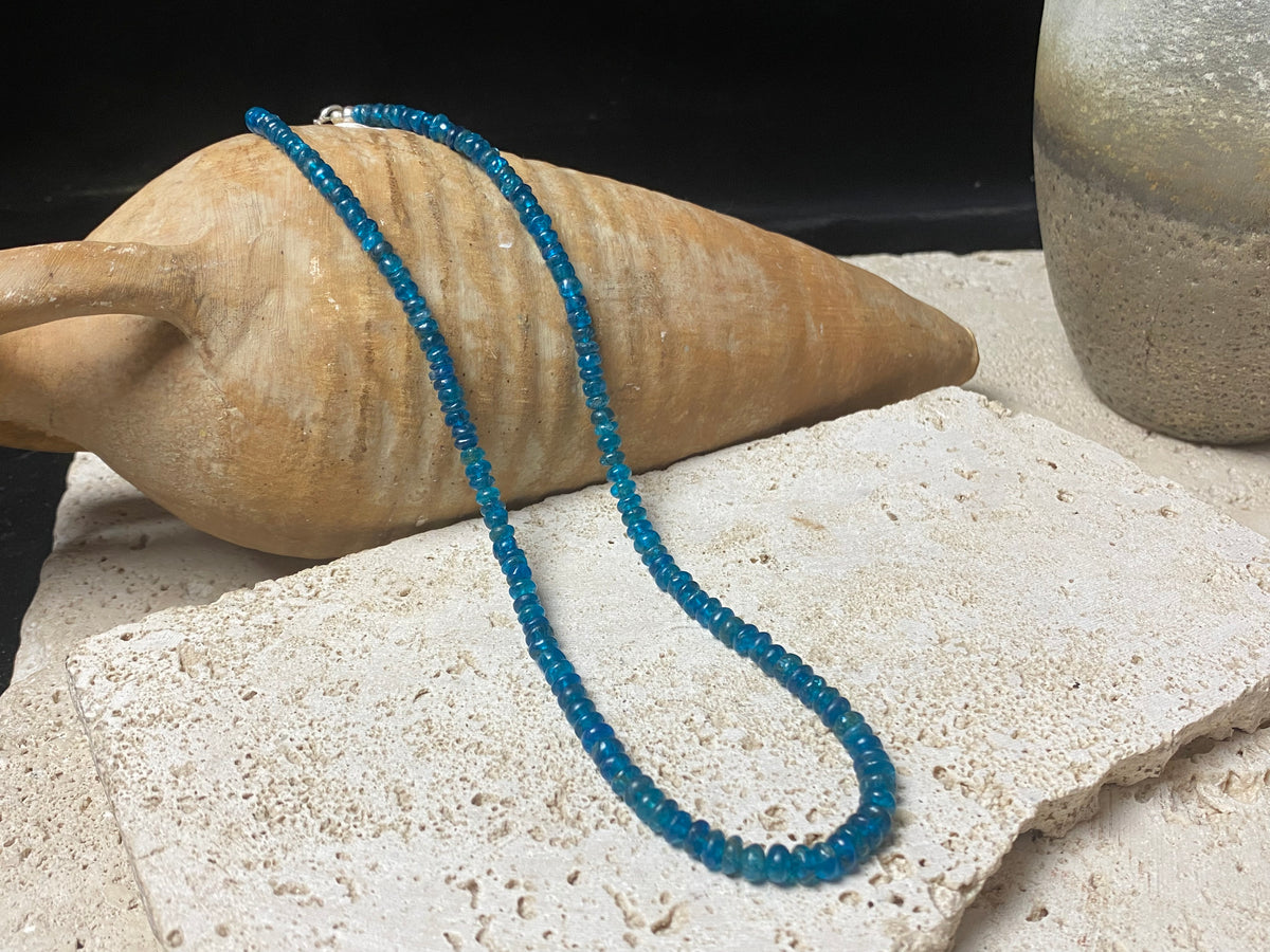 Apatite bead necklace featuring natural cabochon apatite beads graduated and finished with a sterling silver lobster clasp. This is simply stunning and a lovely statement necklace that matches any skin tone or clothing choice. 45 cm length