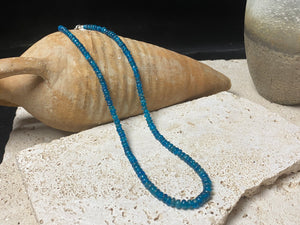 Apatite bead necklace featuring natural cabochon apatite beads graduated and finished with a sterling silver lobster clasp. This is simply stunning and a lovely statement necklace that matches any skin tone or clothing choice. 45 cm length